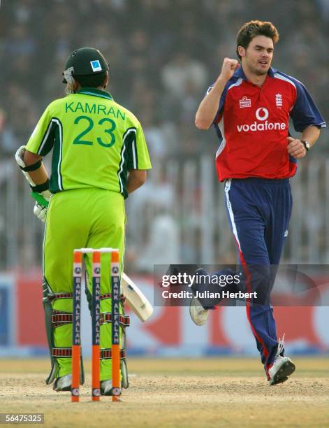 James Anderson of England celebrates taking the wicket of Kamran Akmal during the fifth One Day International between Pakistan and England played at...