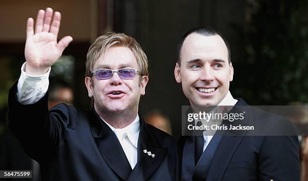 Celebrity couple Sir Elton John and David Furnish leave as a married couple following their civil partnership ceremony at the Guildhall, Windsor on...