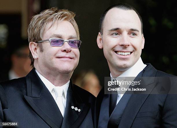 Celebrity couple Sir Elton John and David Furnish leave as a married couple following their civil partnership ceremony at the Guildhall, Windsor on...