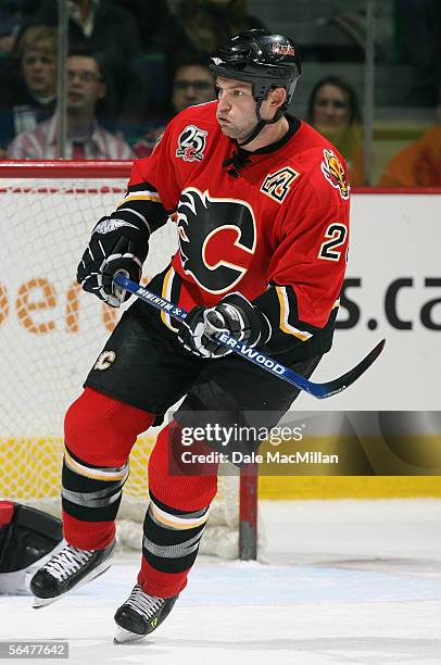 Robyn Regehr of the Calgary Flames skates against the Boston Bruins during their NHL game at Pengrowth Saddledome on December 17, 2005 in Calgary,...