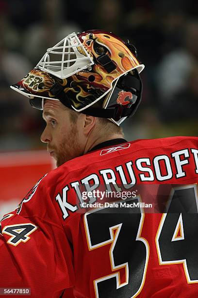 Goaltender Miikka Kiprusoff of the Calgary Flames looks on during a break in game action against the Boston Bruins during their NHL game at Pengrowth...