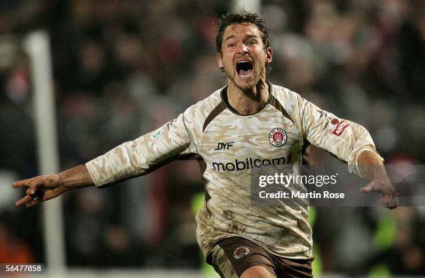 Florian Lechner of St.Pauli celebrates scoring the third goal during extra time in the last sixteen match of the DFB German Cup match between FC St....