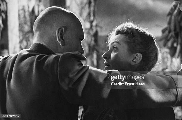 Actor Yul Brynner stars as Major Surov with Deborah Kerr as Diana Ashmore in the film 'The Journey', directed by Anatole Litvak, 1959.