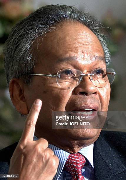 Newly appointed Supreme Court chief justice Artemio Panganiban gestures during his first news conference in Manila, 22 December 2005. Panganiban,...