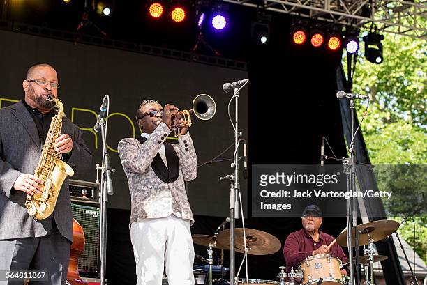 American Jazz musician Roy Hargrove plays trumpet as he leads his quintet during the Blue Note Jazz Festival at Central Park SummerStage, New York,...