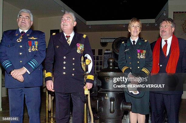 General-Major Gerard Van Caelenberge, Admiral Jean-Paul Robyns, General Danielle Levillez and Defence Minister Andre Flahaut pose 22 December 2005,...