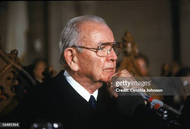 Supreme Court Associate Justice William J. Brennan Jr. , listens to arguments regarding the authorship of William Shakespeare's works during a moot...