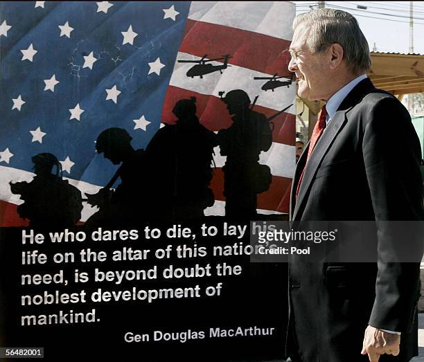 Secretary of Defense Donald Rumsfeld attends a medal ceremony for soldiers in the U.S. Army 173rd Airborne at an air base December 22, 2005 in...