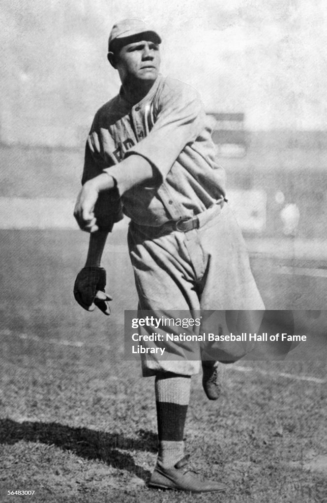 Babe Ruth First Team Babe Ruth of the Boston Red Sox throws the ball before a game. Babe ...