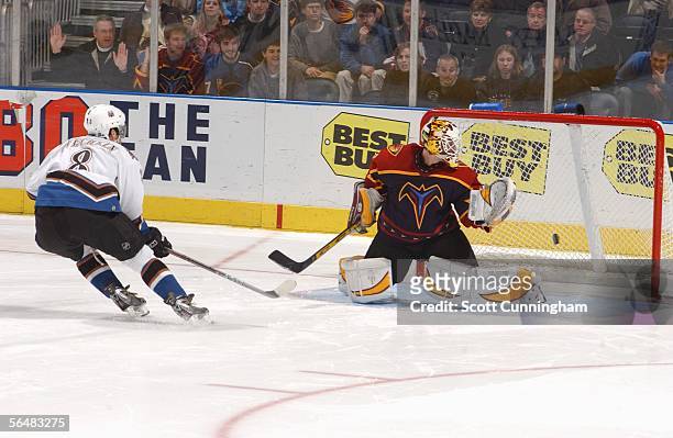 Alexander Ovechkin of the Washington Capitals scores a goal in the shootout against Michael Garnett of the Atlanta Thrashers on December 22, 2005 at...