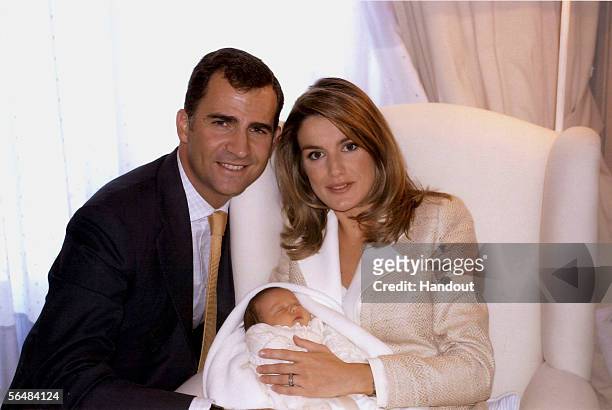 In this handout image from the Spanish Royal House, Crown Prince Felipe de Bourbon , his wife Princess Letizia, and their newborn daughter, Princess...