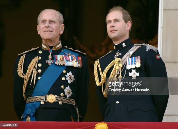 Prince Edward, Earl of Wessex and Prince Philp, Duke of Edinburgh watch the flypast over the Mall of British and US World War II aircraft from the...