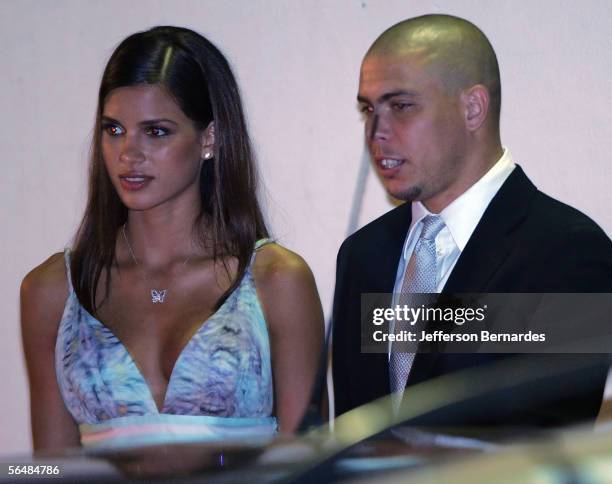 Ronaldo Nazario and his new girlfriend Raica de Oliveira attend the wedding of Brazilan soccer player Ricardo Izecson dos Santos Leite, also known as...