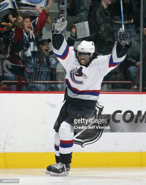 Anson Carter of the Vancouver Canucks celebrates his goal during their NHL game against the Calgary Flames at General Motors Place on December 23,...