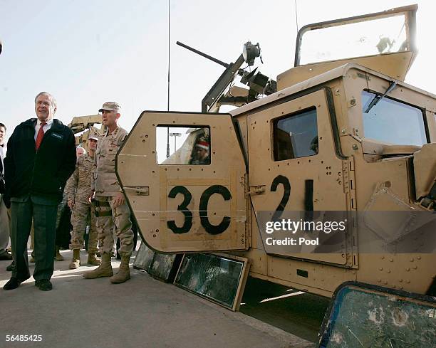 John Rumsfeld Secretary Of Defense Rumsfeld Visits Troops Photos and Premium High Res ...