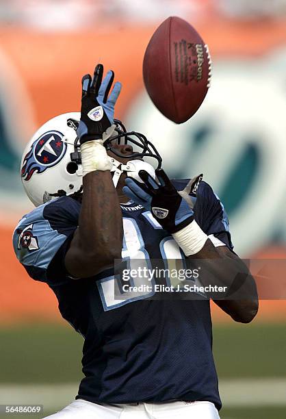 Pacman Jones of the Tennessee Titans returns a kick against the Miami Dolphins on December 24, 2005 at Dolphins Stadium in Miami, Florida.