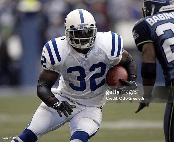 Running back Edgerrin James of the Indianapolis Colts rushes against the Seattle Seahawks at Qwest Field on December 24, 2005 in Seattle, Washington....