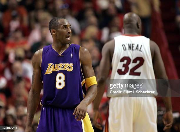 Shaquille O'Neal of the Miami Heat shows his back to Kobe Bryant of the Los Angeles Lakers on December 25, 2005 at the American Airlines Arena in...