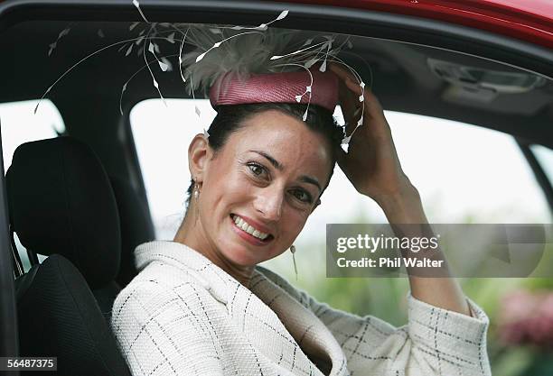 Ruth Sibald, winner of Fashion in the Field, poses for photographers during day one of the Summer Racing Carnival at the Ellerslie Racecourse...