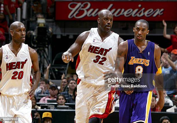 Shaquille O'Neal of the Miami Heat after dunking with Kobe Bryant of the Los Angeles Lakers shares a word on December 25, 2005 at American Airlines...