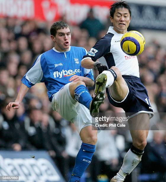 Neil Kilkenny of Birmingham challenges Lee Young-Pyo of Tottenham Hotspur for the ball during the Barclays Premiership match between Tottenham...