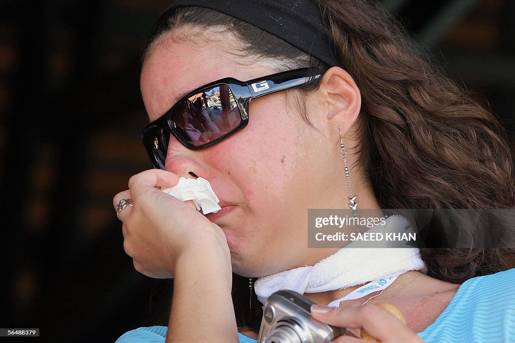 A French mourner cries at the Sofitel re