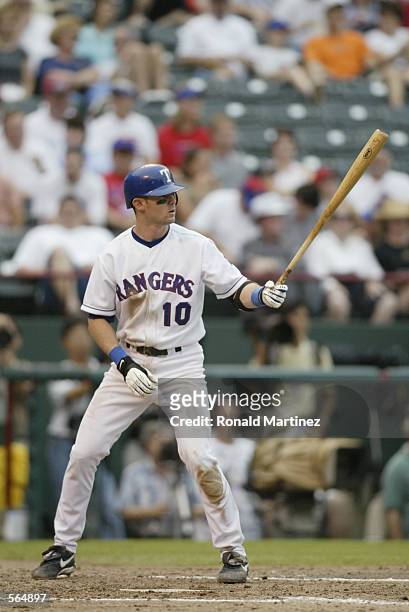 Second baseman Michael Young of the Texas Rangers waits for the pitch during the MLB game against the Detroit Tigers at The Ballpark in Arlington,...