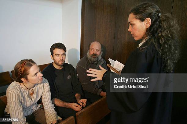 Pro-Palestinian activists arrested by Israel appear for their deportation hearing at the District Court on December 27, 2005 in Tel Aviv, Israel....