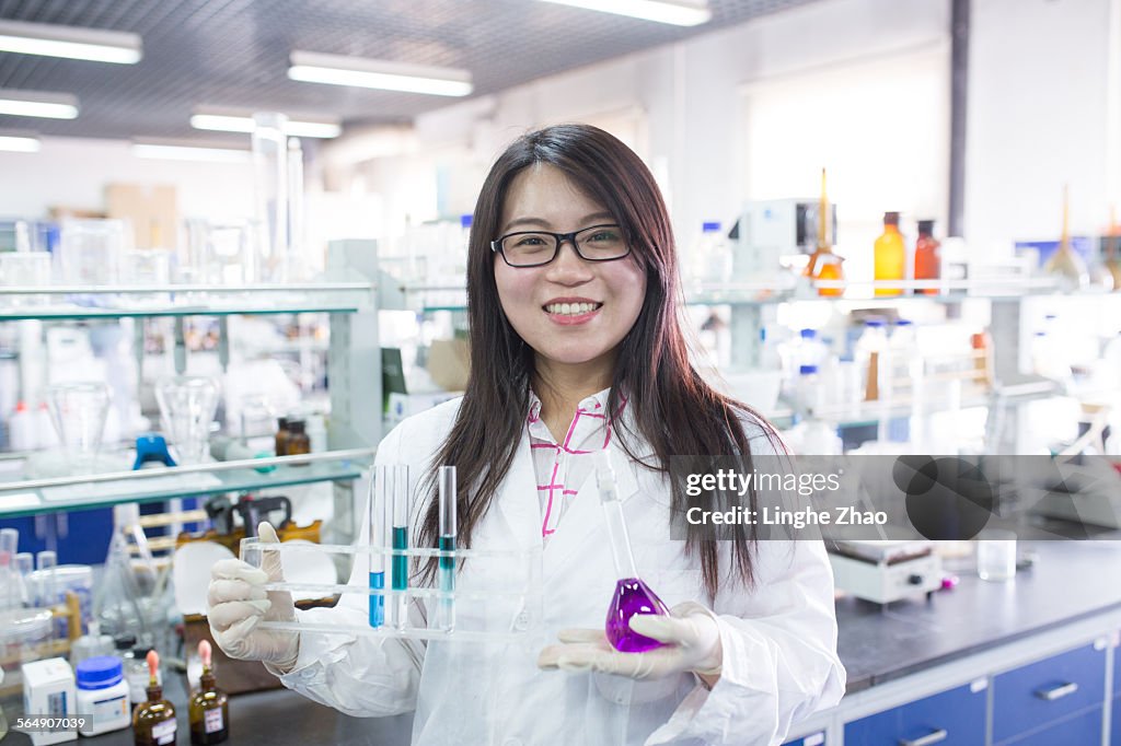 ,Smiling female scientist