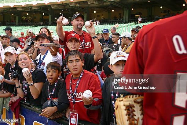 Fans of the Houston Astros seek autographs from Chad Qualls before Game Three of the Major League Baseball World Series against the Chicago White Sox...