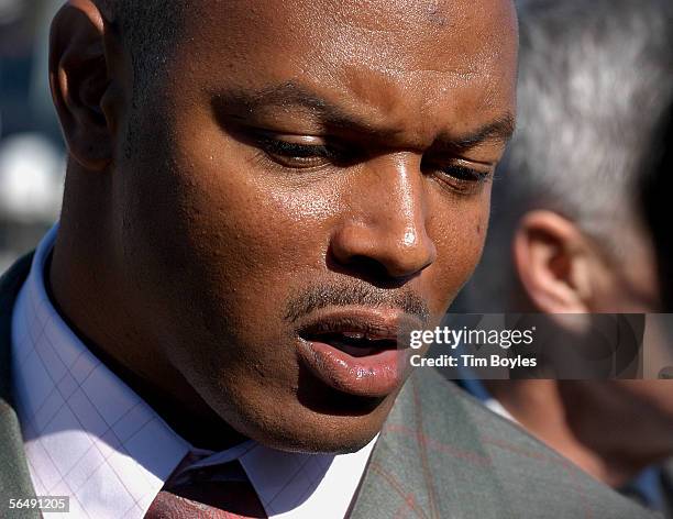 Shelton Quarles, former linebacker for Coach Tony Dungy, speaks to the news media after the funeral for James Dungy December 27, 2005 in Tampa,...