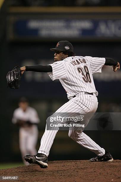 Ezequiel Astacio of the Houston Astros pitches during the 14th inning of Game Three of the Major League Baseball World Series against the Chicago...