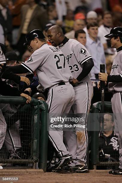 Geoff Blum of the Chicago White Sox is greeted by Jermaine Dye after hitting a solo home run in the 14th inning of Game Three of the Major League...