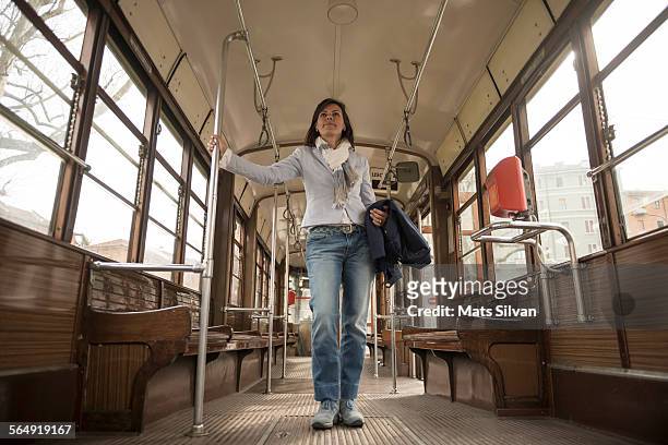 woman travel in a tram - milan tram stock pictures, royalty-free photos & images
