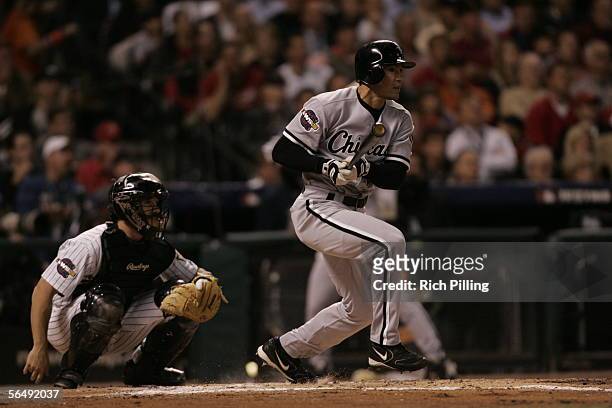 Scott Podsednik of the Chicago White Sox bats as Brad Ausmus of the Houston Astros catches during Game Four of the Major League Baseball World Series...