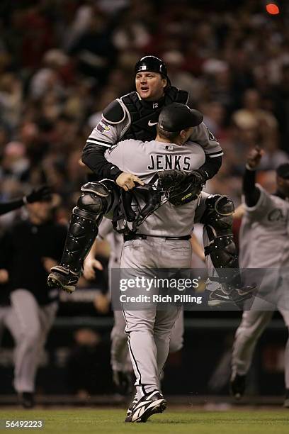 Bobby Jenks and A.J. Pierzynski of the Chicago White Sox celebrate after winning the 2005 World Series in four games against the Houston Astros at...