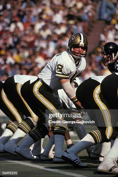 Quarterback Archie Manning of the New Orleans Saints at the line of scrimmage during a game against the Pittsburgh Steelers at Three Rivers Stadium...