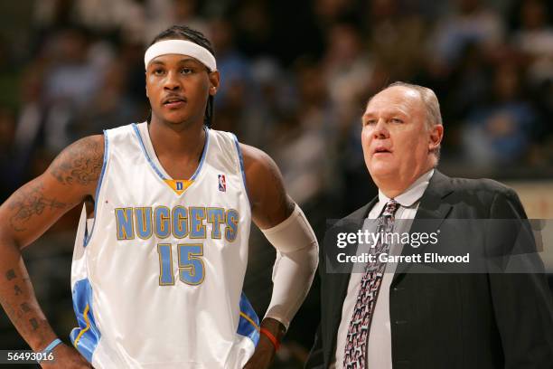 Carmelo Anthony and head coach George Karl of the Denver Nuggets stand during the game against the Philadelphia 76ers on December 27, 2005 at the...