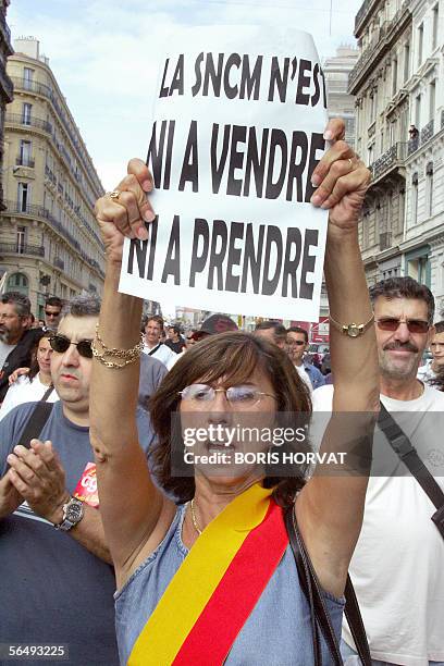 Picture taken 01 October 2005 in Marseille of employees of the National Corsica Mediteranean Company and relatives protesting against the project of...