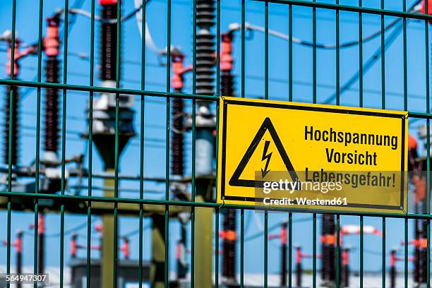 electricity substation, warning sign, high voltage - wilhering stock pictures, royalty-free photos & images