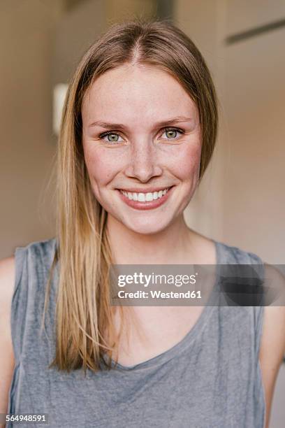 portrait of smiling blond woman - flushing stock pictures, royalty-free photos & images