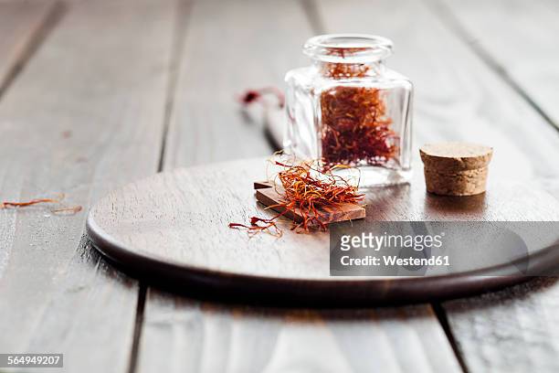 glass of persian saffron - saffron stock pictures, royalty-free photos & images