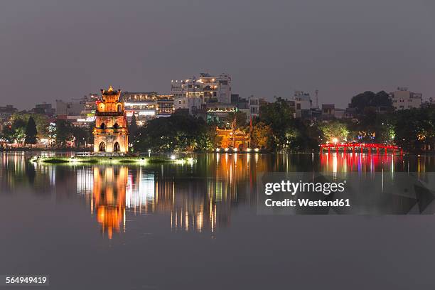 vietnam, hanoi, hoan kiem lake, ngoc son temple, the huc bridge at night - huc bridge stock pictures, royalty-free photos & images