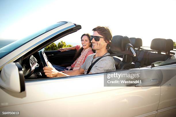 south africa, happy couple in convertible - toyota south africa motors stock pictures, royalty-free photos & images