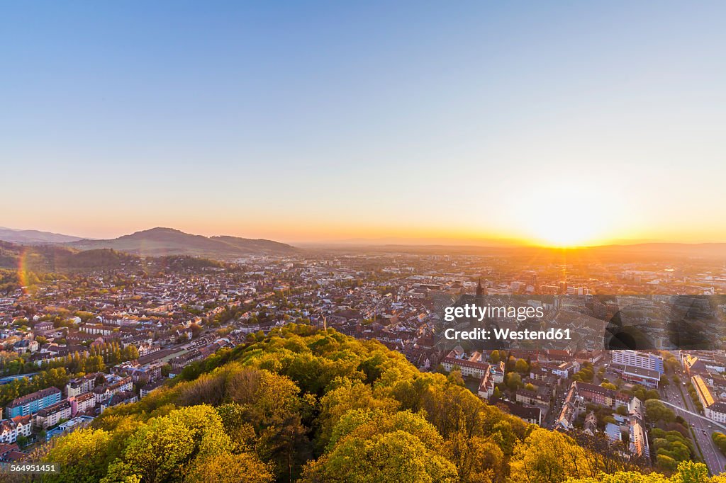 Germany, Baden-Wuerttemberg, Freiburg, City view at sunset