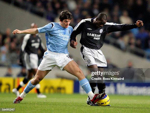 Joe Barton of Manchester is challenged by Claude Makelele of Chelsea during the Barclays Premiership match between Manchester City and Chelsea at the...