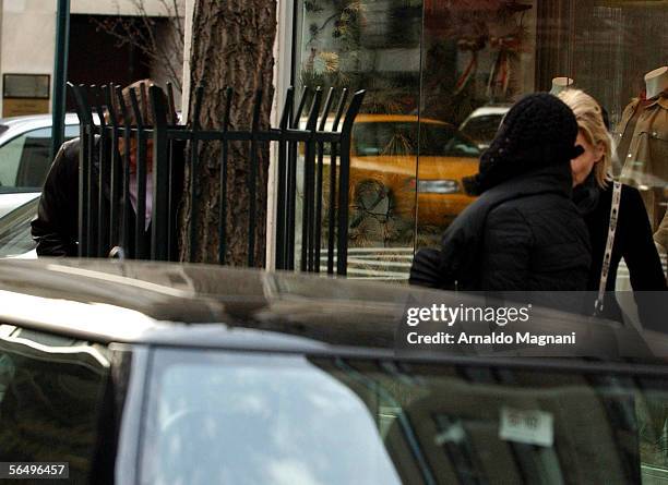 Gerard Depardieu walks with Clementine Igou on December 28, 2005 in New York City.