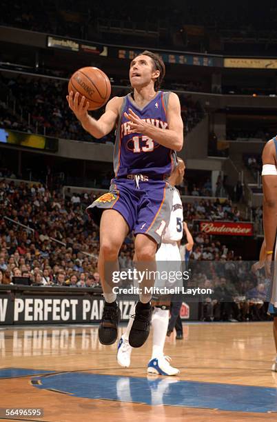 Steve Nash of the Phoenix Suns goes to basket against the Washington Wizards in a NBA game on December 28, 2005 at the MCI Center in Washington, DC....