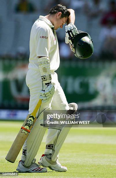 South African batsman Graeme Smith trudges off after been dismissed by Australian paceman Glenn McGrath on the fourth day of the second Test Match...