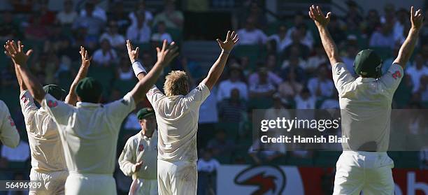 Shane Warne of Australia leads his team mates in an unsuccessful appeal against Ashwell Prince of South Africa in the final over of the days play...